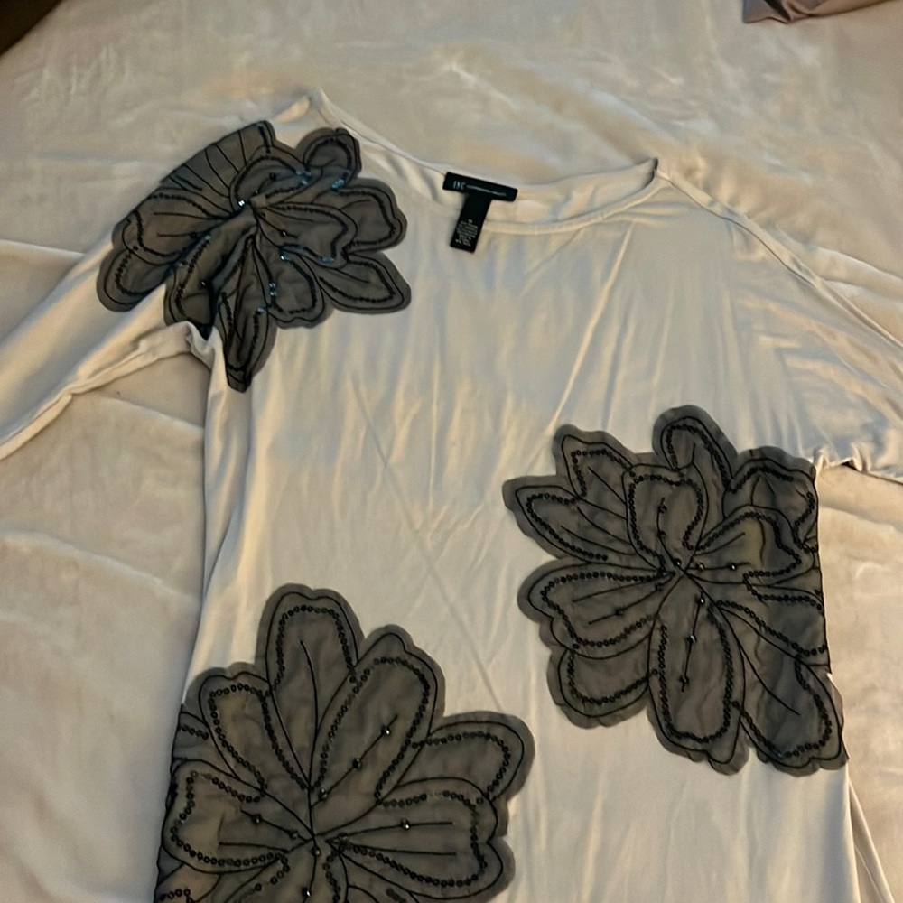 Tan tunic top off the shoulder. Size M